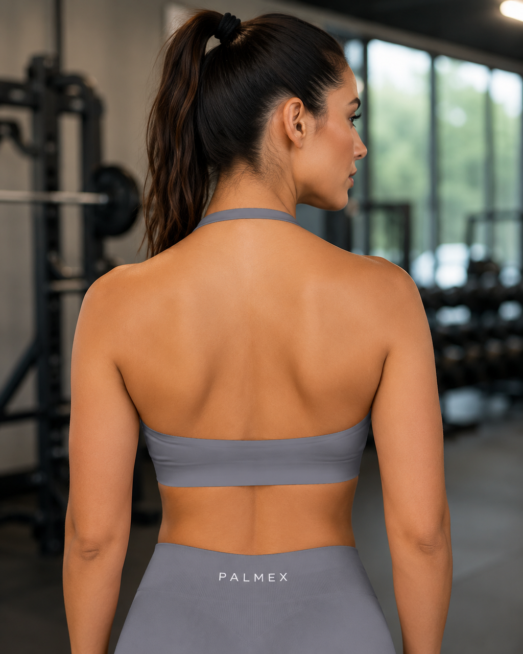 Rückseite des grauen Palmex Sculpt Sport-BHs im modernen Neckholder-Design mit glatter Rückenpartie.